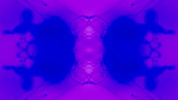 Kaleidoscopic effect of green and yellow light on a black background. alt