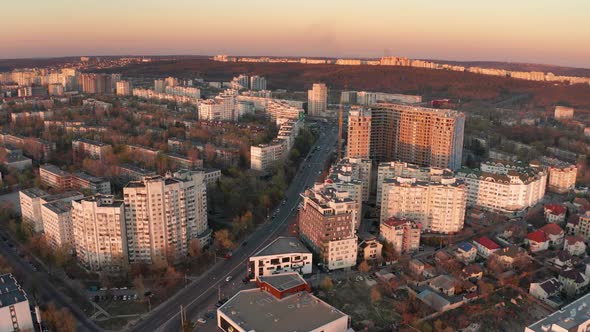 Establishing Alow Push Aerial Shot of Chisinau Moldova at Sunset alt