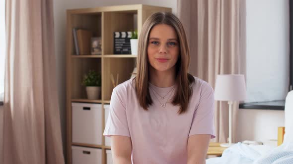 Teenage Girl Recording Video Blog at Home alt