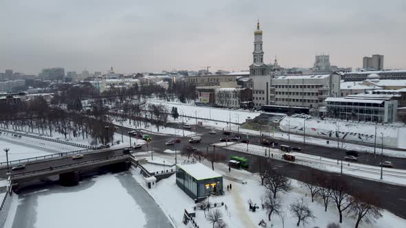 Winter aerial city view, river embankment Kharkiv