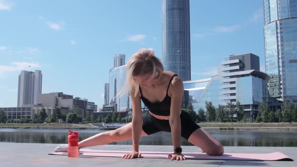 Woman working out in city