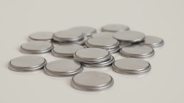 Lot of button watch batteries slow tilt 4K video alt