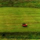 Orange Dump Truck Driving In The Green Field - VideoHive Item for Sale