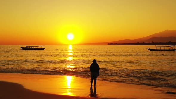 Lady alone sunbathing on tranquil sea view beach holiday by shallow sea and white sand background of alt