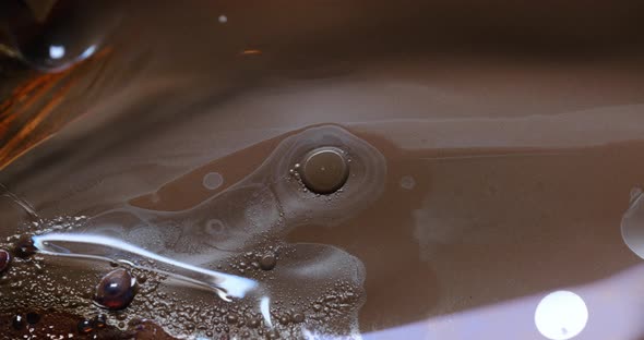 Old film strip burn with bubble.plastic burning bubbles fire closeup 35mm old film alt