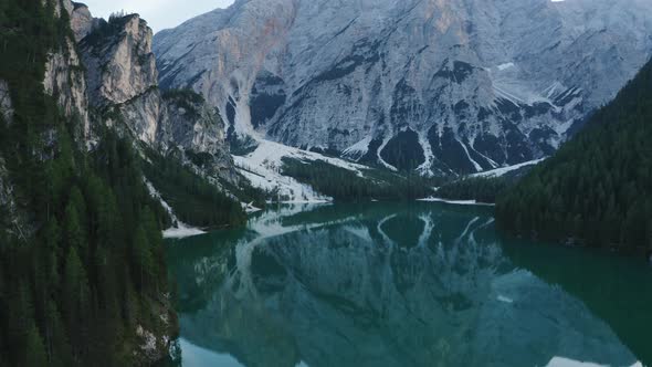 Aerial View of Lake Braies in Dolomites Mountains Water Reflections alt