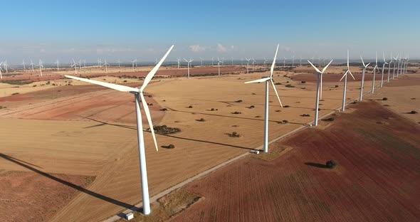 aerial view of a eolic wind mill park in countryside alt