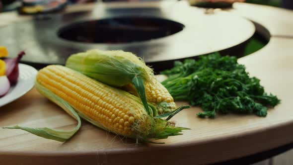 Raw Vegetables Laying Near Bbq Grill Outdoors alt