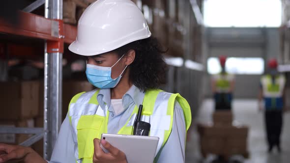 Inventory Manager Working on Tablet in Storehouse alt