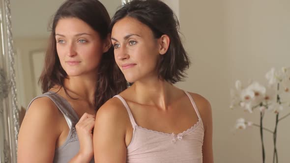 Portrait of two females in nightwear