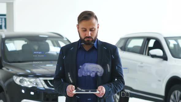 Businessman Shows Hologram Car on His Hand. Man in Business Suit with Future Technology Screen and
