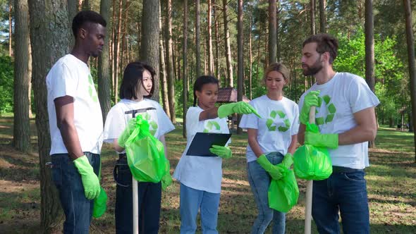 Group of Eco Activists Fighting for the Preservation of Nature African Girl Activist Gives a Task to alt