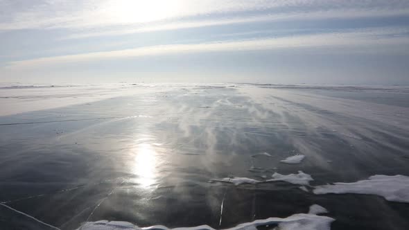 Snow Is Flying Over Surface of Ice of Lake Baikal