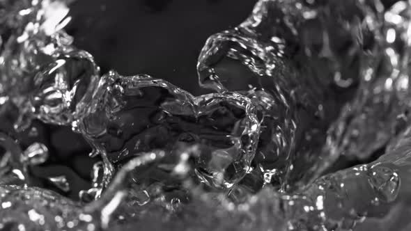 Super Slow Motion Shot of Bubbles on the Water Surface in 1000 Fps alt
