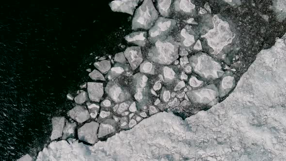 Cracked Ice Floating In The Lake Superior in Duluth, Minnesota. - aerial alt