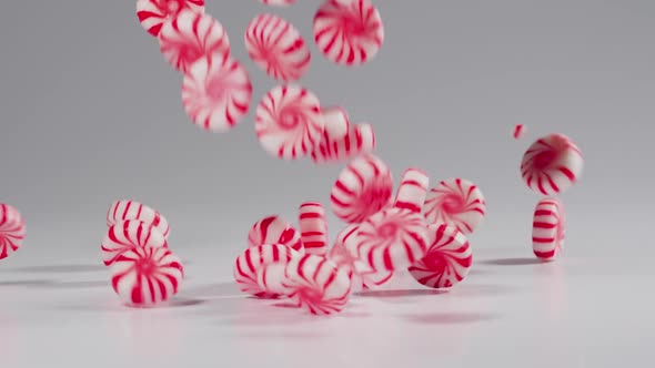 Peppermint candies falls in slow motion alt