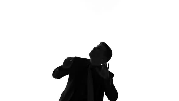 Male Silhouette Crushed by Injustice, Corruption Problem, High Taxes and Debts alt