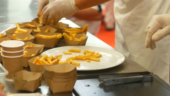 Chef Serves French Fries