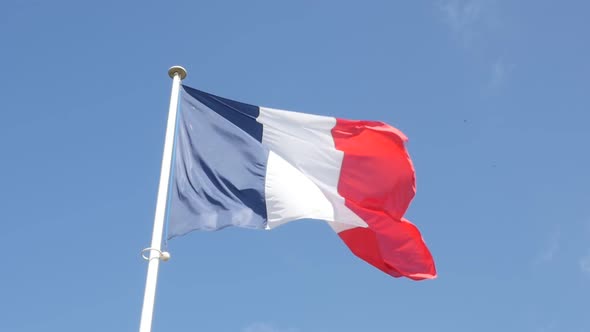 Slow motion of French flag fabric waving in front of blue sky 1920X1080 FullHD footage - Tricolor fl alt