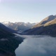 Slow flight Multinskoe Lake in the Altai Mountains in Cloudy Morning - VideoHive Item for Sale