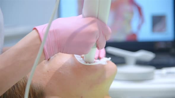 Dentist Scaning Patient's Teeth With 3d Scanner In Clinic.