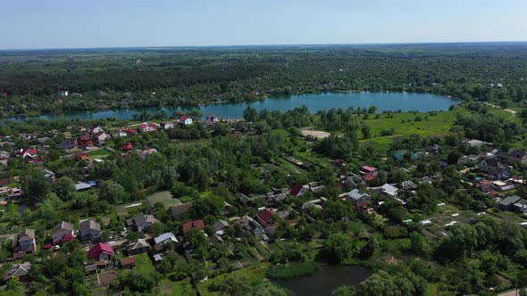 Surroundings of Residential Buildings and a Beautiful Lake
