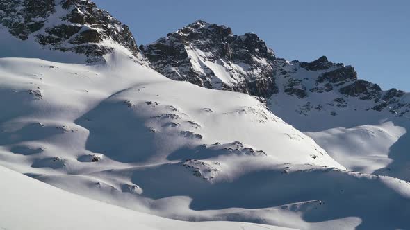 8K Cloudless Morning Sky on Snowy High Rocky Mountain Peak alt