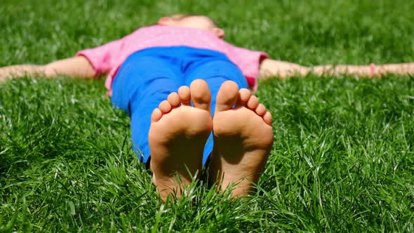 Child Feet on the Grass, Stock Footage | VideoHive