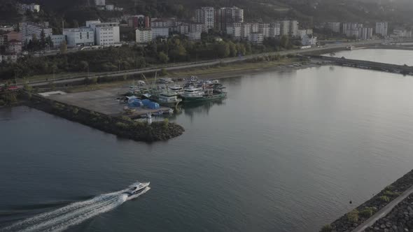 Trabzon City Following Boat In Canal Aerial View