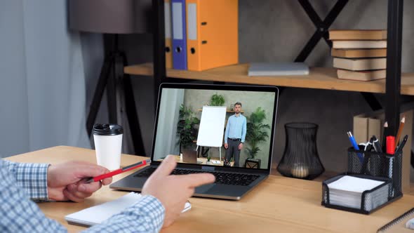 Businessman in Office Tells Study Online Video Call Webcam Chat Laptop Computer alt