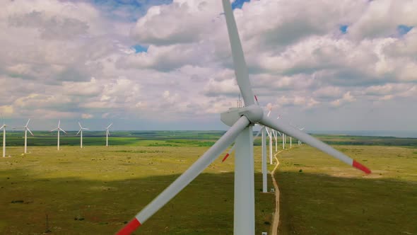 Aerial Drone Shot Windmills For Electric Power. Energy Production with clean and Renewable Energy