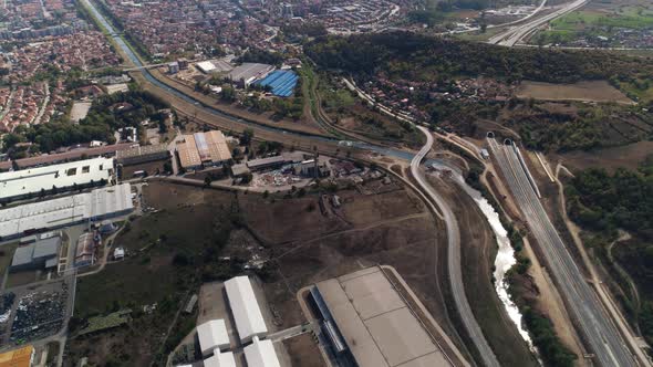 Town Landscape river high altitude flying drone shot in Pirot, Serbia.