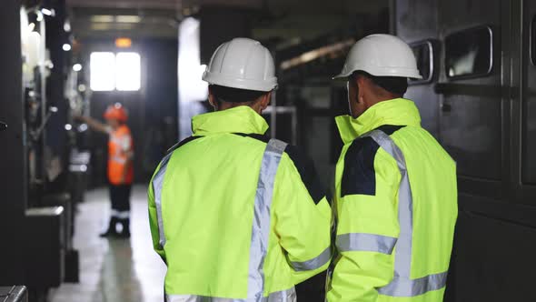 Two Engineer Team With Perfect Safety Uniform Brainstorming Idea Planning Project of Industry alt