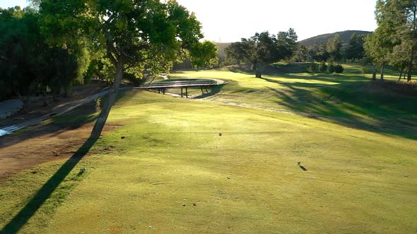 Aerial drone of San Vicente Golf Course in Ramona California during sunrise alt