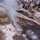 Aerial View Of Firemen Calming The Fire In A Building 4K - VideoHive Item for Sale