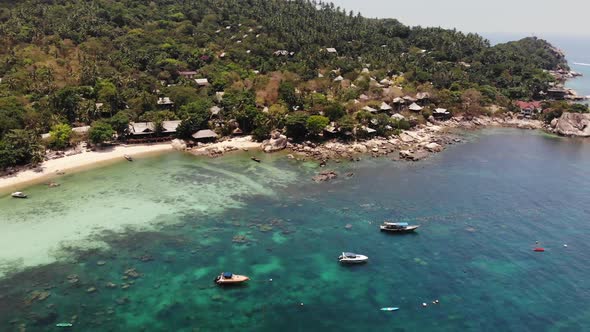 Boats in Calm Sea in Port. Drone View of Fishing and Dive Boats Floating on Tranquil Surface alt