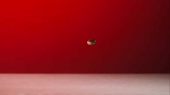 Bullets falling bouncing in ultra slow motion 1500fps on a reflective surface - BULLETS PHANTOM  alt