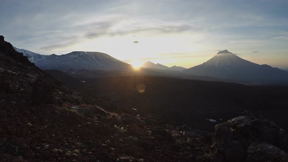 Volcanic Landscape of Kamchatka: View of Sunrise over Volcanoes