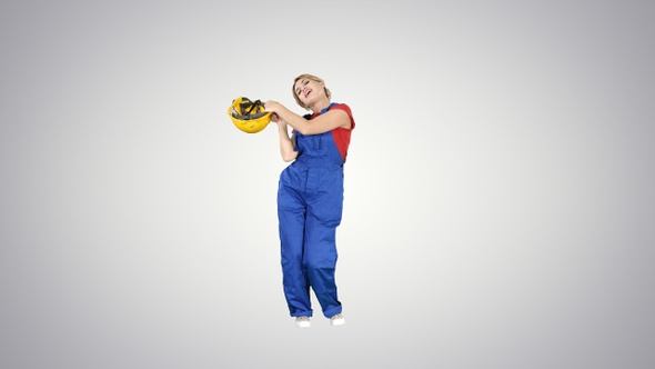 Tradeswoman dancing Construction uniform dressed woman alt