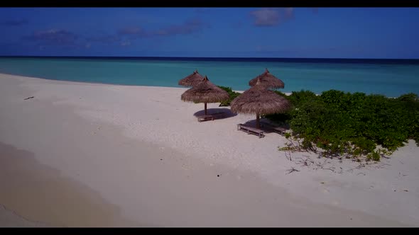 Aerial panorama of tropical coast beach voyage by blue ocean with white sandy background of a picnic alt