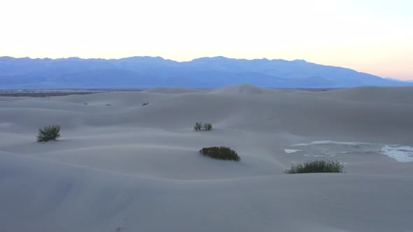 Panoramic view of dunes during sunset. Deep shadows. Drone shot alt