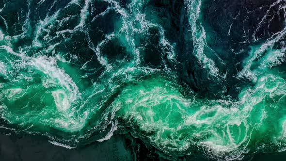 Waves of Water of the River and the Sea Meet Each Other During High Tide and Low Tide alt