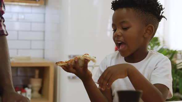 Father and son cooking together alt