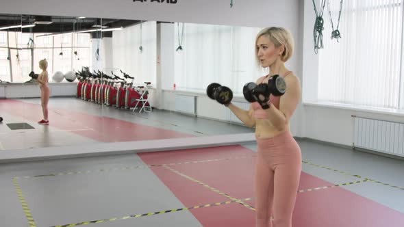 Young woman training in a sports club