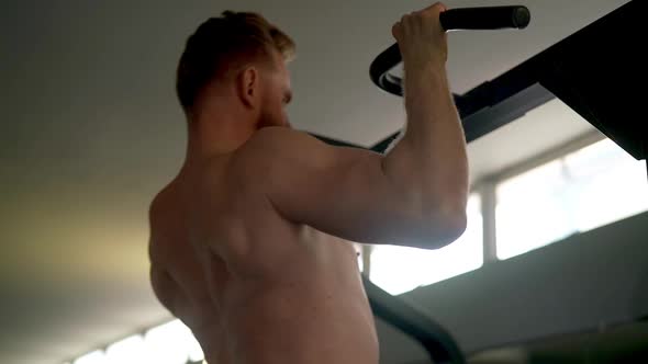 Quick Shot of a Black Pull Up Bar in an Indoor Gym alt