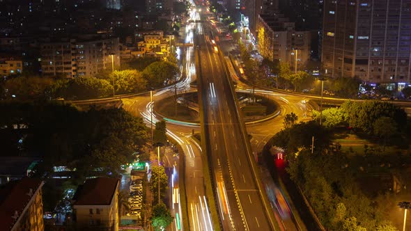 Guangzhou Night Roundabout Highway Traffic Aerial Cityscape Panorama China Timelapse Pan Up alt