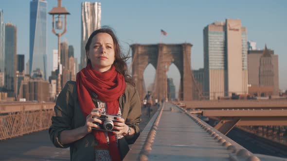 Young girl with a retro camera  alt