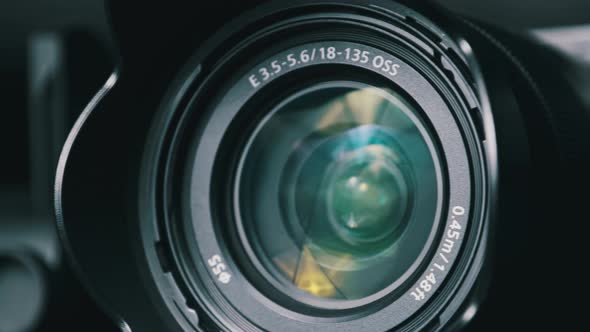 The Camera Lens Rotates Lights Reflecting Off Glass Robotic Camera Movement alt