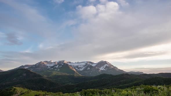 Time lapse of clouds moving over Timpanogos Mountain alt
