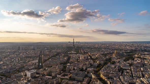 Paris, France, Timelapse - Wide angle view of Paris as seen from the Montparnasse tower at sunset